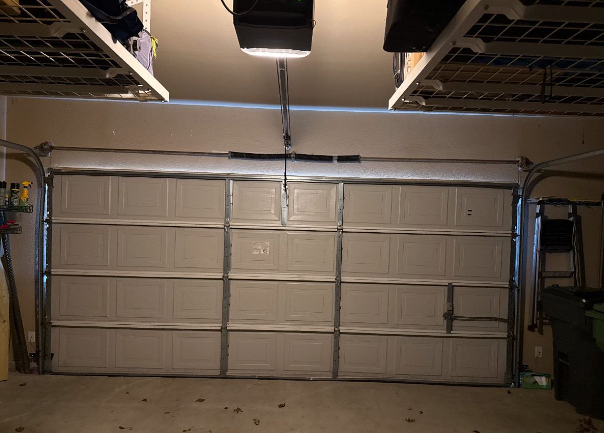 Broken garage door spring repair in Garland TX
